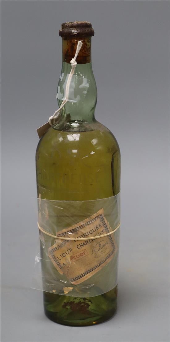 One bottle of vintage yellow Grande Chartreuse Liqueur, circa 1951-56, remnants of label